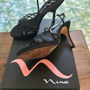 2 pair one brown one Black Nina sandal size 7.5